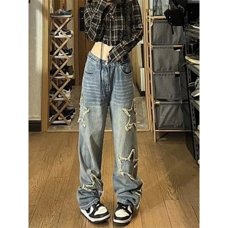 Blue high-waist wide-leg denim trousers with straight cut on mannequin