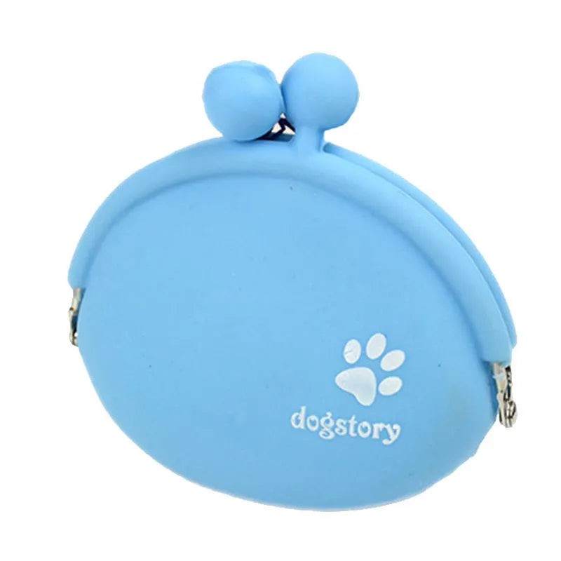 Yellow silicone dog treat pouch with hook and loop strap, shown on a waistband.