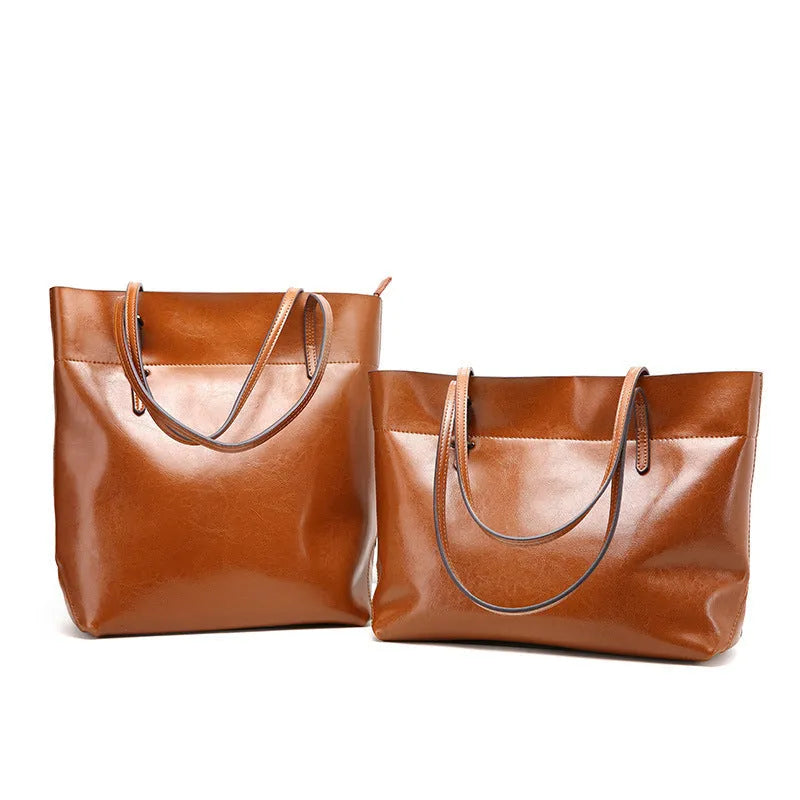 Horizontal waxed cowhide leather crossbody handbag for women showing internal compartments.