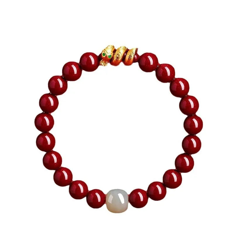 Handmade red cinnabar bracelet with snake zodiac beads, shown in 6mm and 8mm size options.