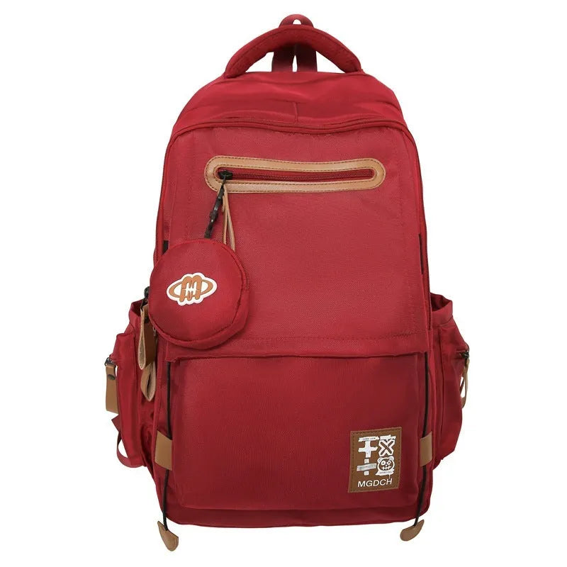 Large-capacity nylon backpack for middle school students with curved shoulder straps in street trend style