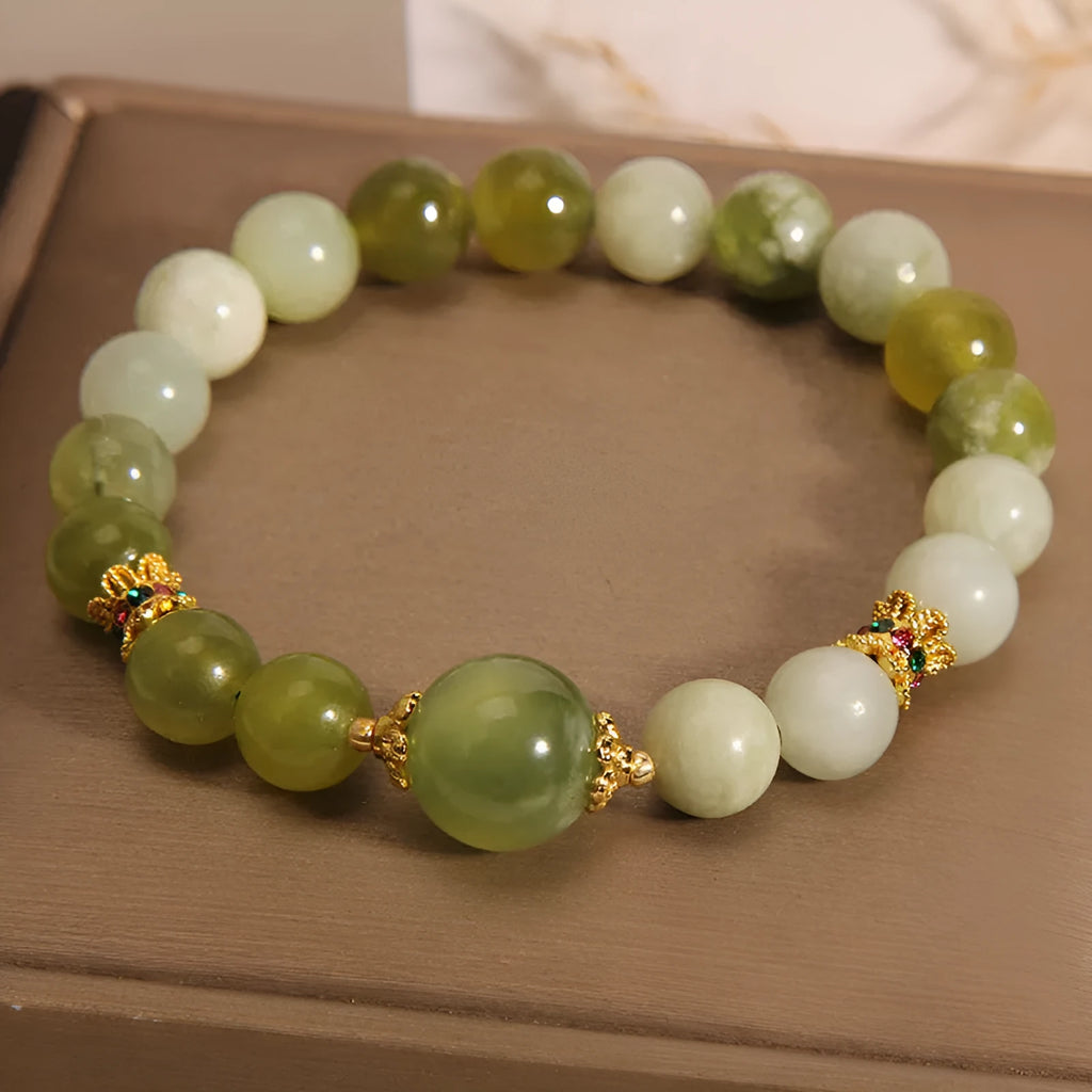 Xiuyan jade green women's bracelet in an original light luxury Mori style design.