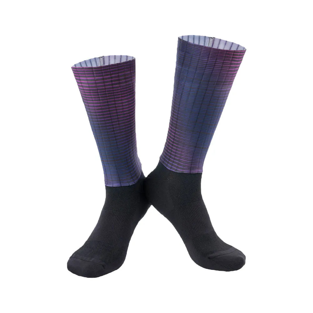 Cycling socks in chemical fibre blend fabric shown in orange, black, purple, white, grey and dark blue colour options