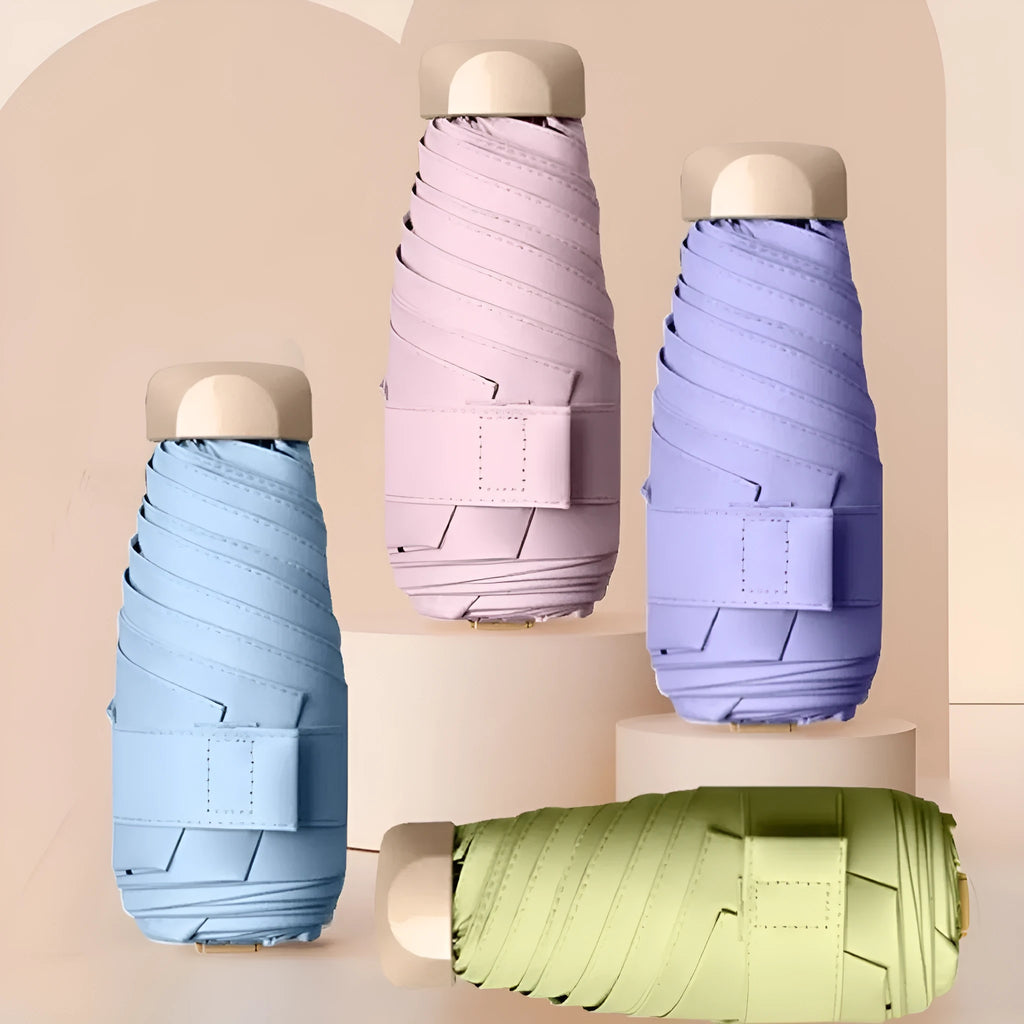 Compact 5-fold manual sun umbrella with gradient vinyl canopy in a choice of eight colours.