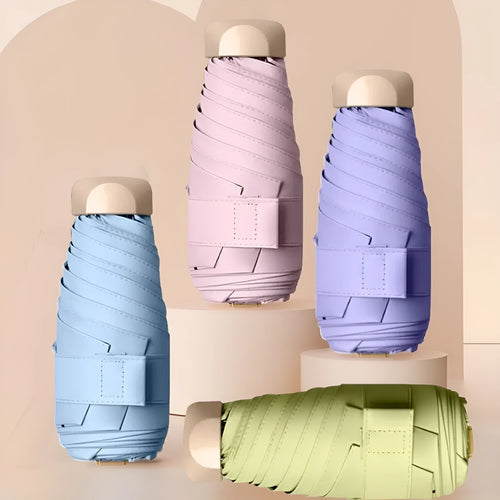 Compact 5-fold manual sun umbrella with gradient vinyl canopy in a choice of eight colours.