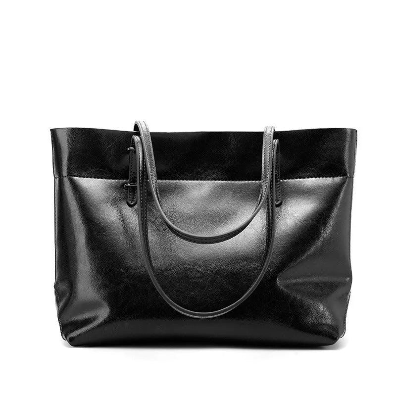 Horizontal waxed cowhide leather crossbody handbag for women showing internal compartments.