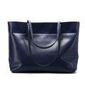 Horizontal waxed cowhide leather crossbody handbag for women showing internal compartments.