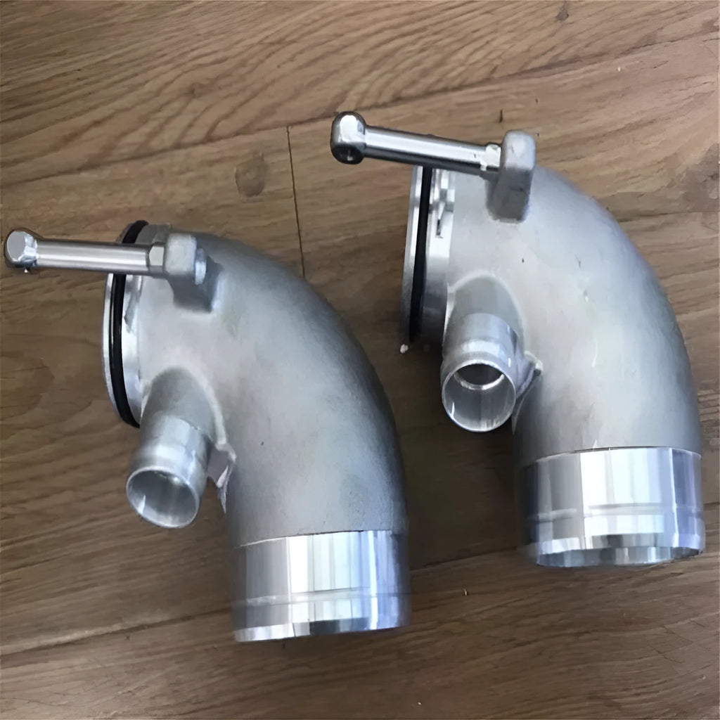 Aluminium alloy 90 degree turbine tube elbow for lateral engine turbo applications