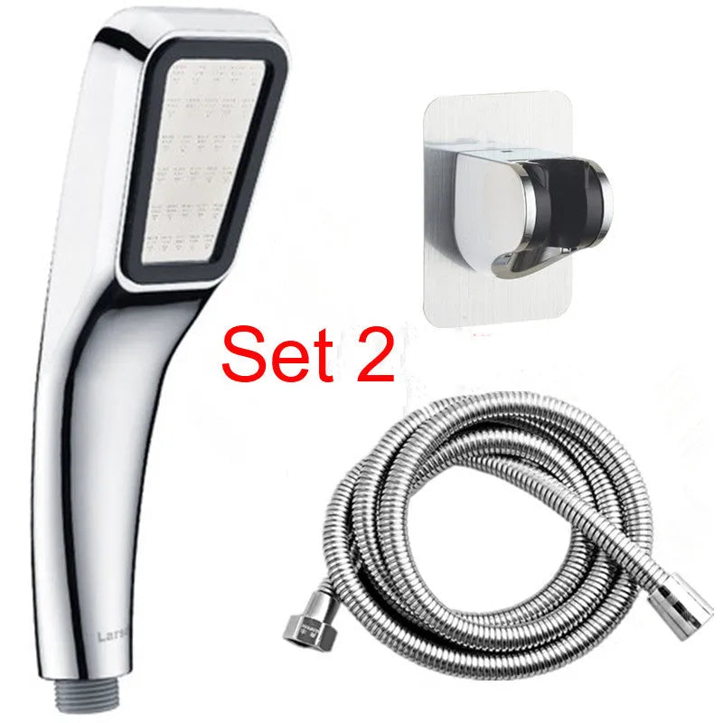 Orange hand-held pressurised shower unit with hose, showing rain shower head and control button.
