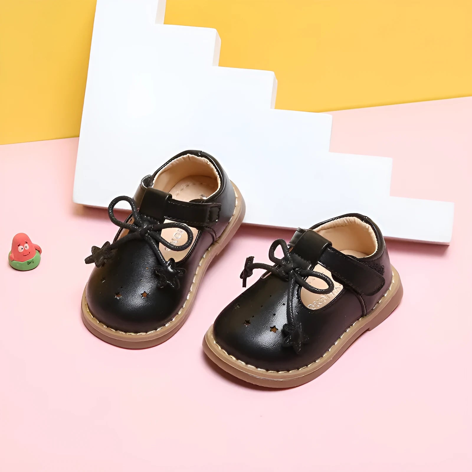 Infant toddler soft sole girls shoes in black microfiber leather, breathable design, side view