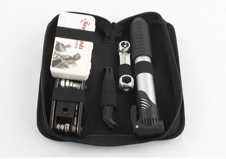 SNJUE AE107 black bicycle repair tool kit with chrome plated socket wrenches, screwdrivers, and tyre repair supplies arranged in case