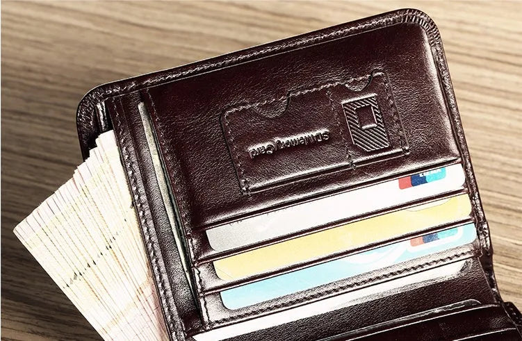 Men's leather wallet showing internal compartments for banknotes, cards, coins, and documents