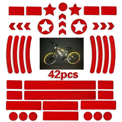 Reflective bicycle safety tape with a geometric grid pattern, shown in red, yellow, blue, and white colours.