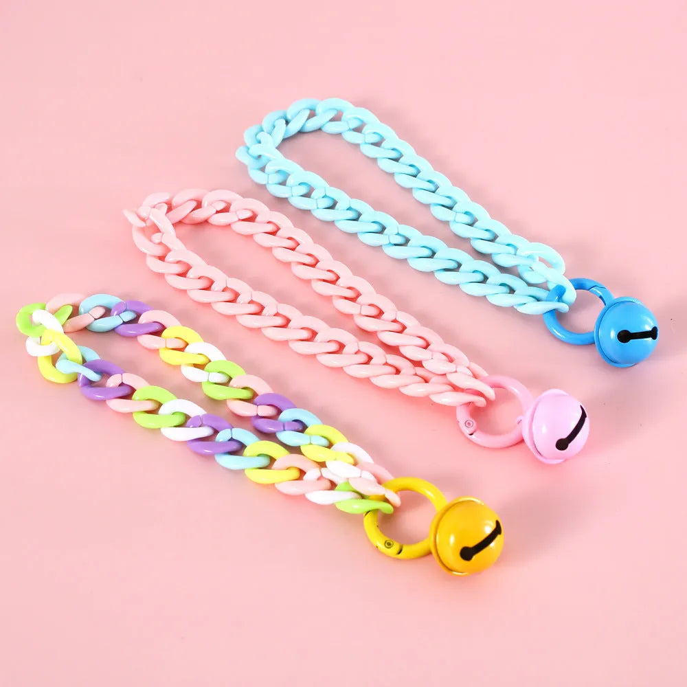 Adjustable plastic pet collar in macaron candy colours for cats, dogs, and rabbits.