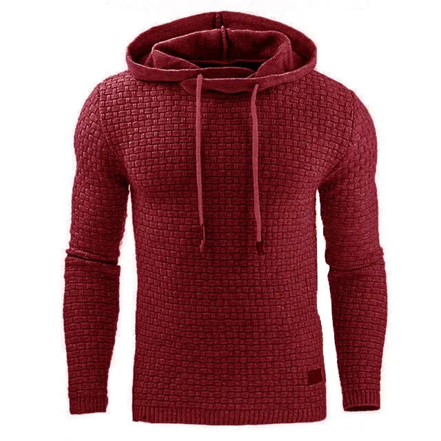 Men's black cotton-polyester blend hooded sweatshirt on a hanger, showcasing the front hood and kangaroo pocket.