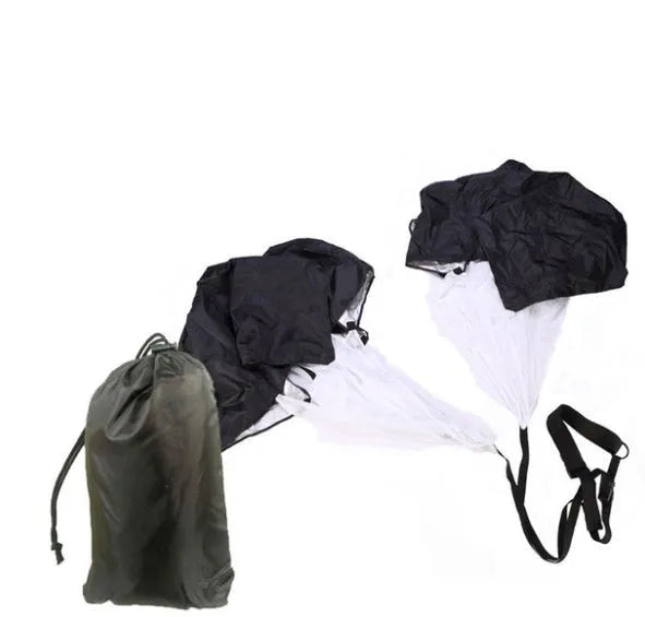 Black 56 inch running speed training parachute with adjustable waist belt on outdoor track