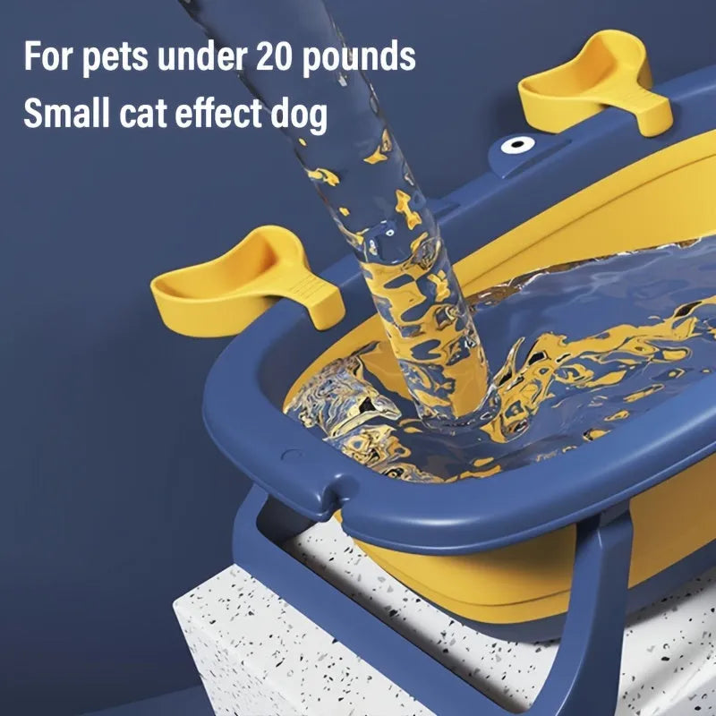 Blue foldable portable pet tub set up for washing a small dog, showing its collapsible metal frame.