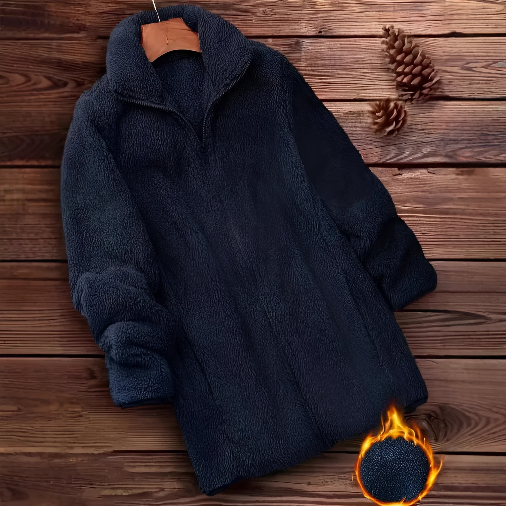Man wearing a black double-sided fleece jacket outdoors, showing soft texture.