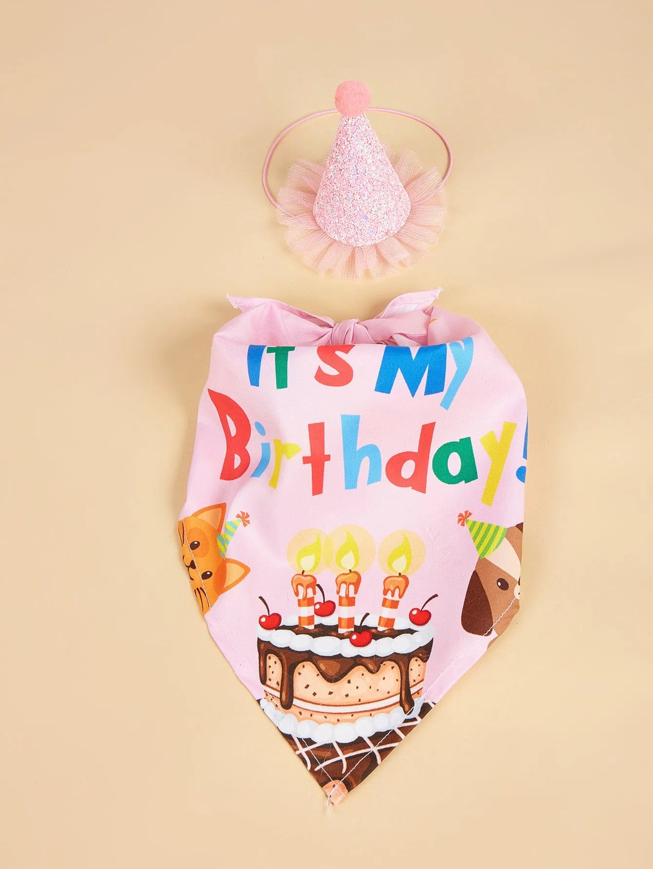 Printed polyester dog birthday hat and drool towel set in blue with creative triangular binder design