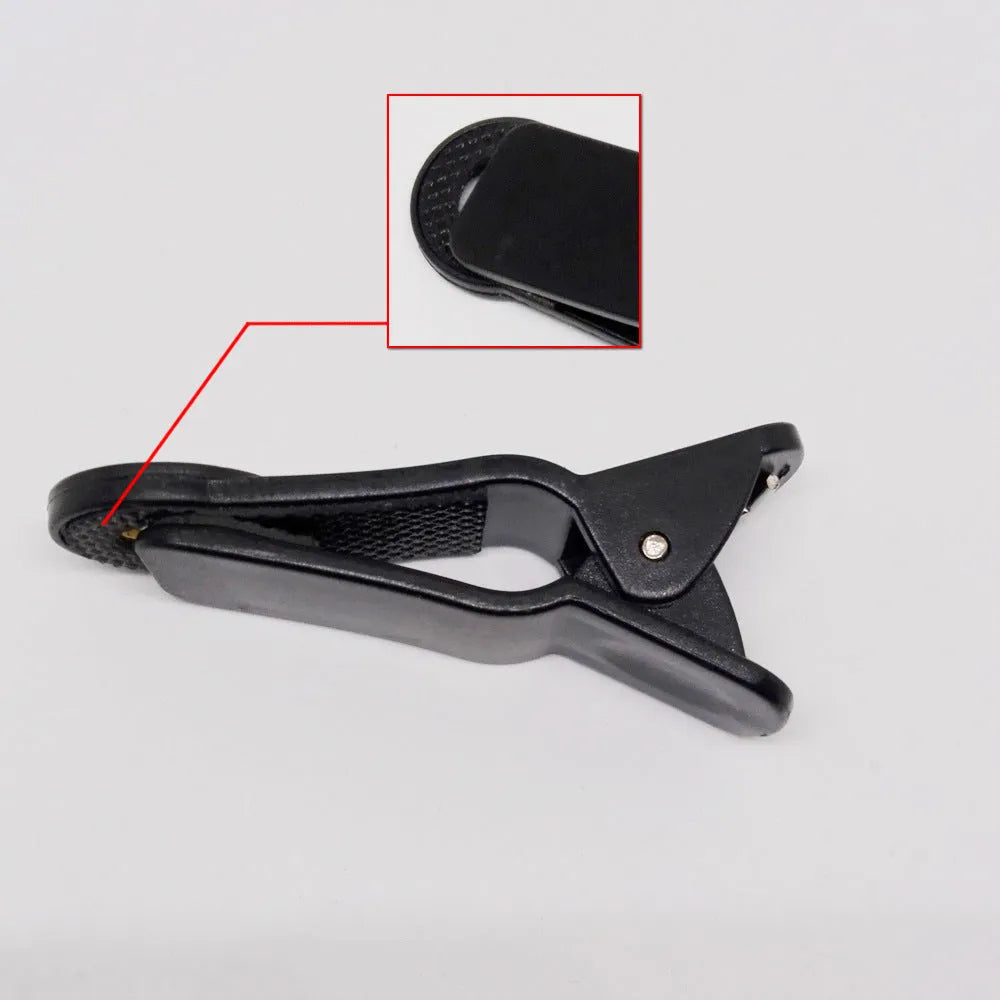 Universal 12X telescopic lens with clip for smartphone attachment