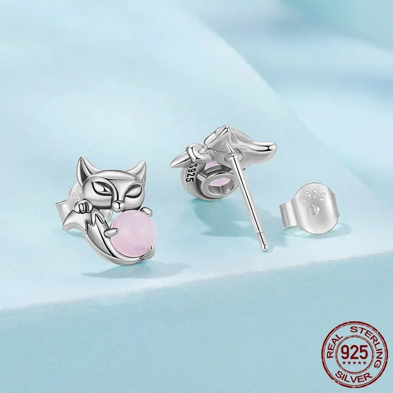 S925 sterling silver fox stud earrings with green jade inlay on white background