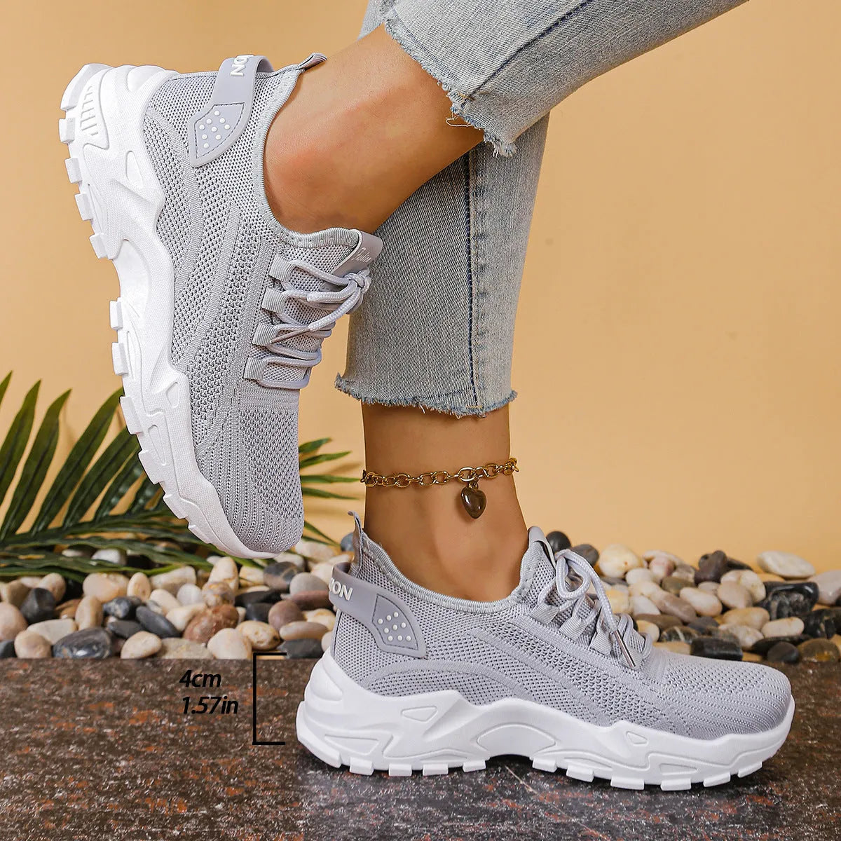 Women's low-top sports shoes with mesh upper and white sole in multiple colours.