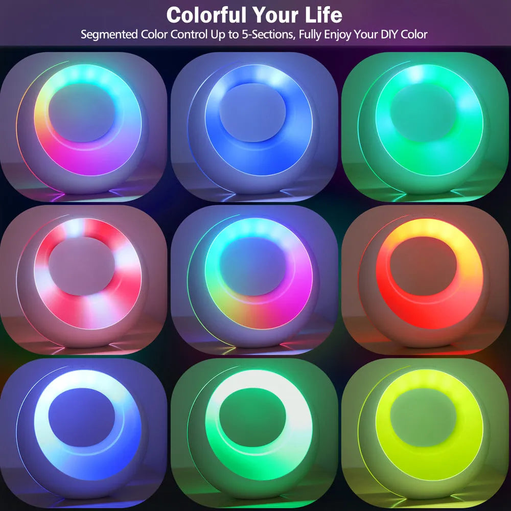 Small white RGB colour changing night lamp with remote control on wooden desk