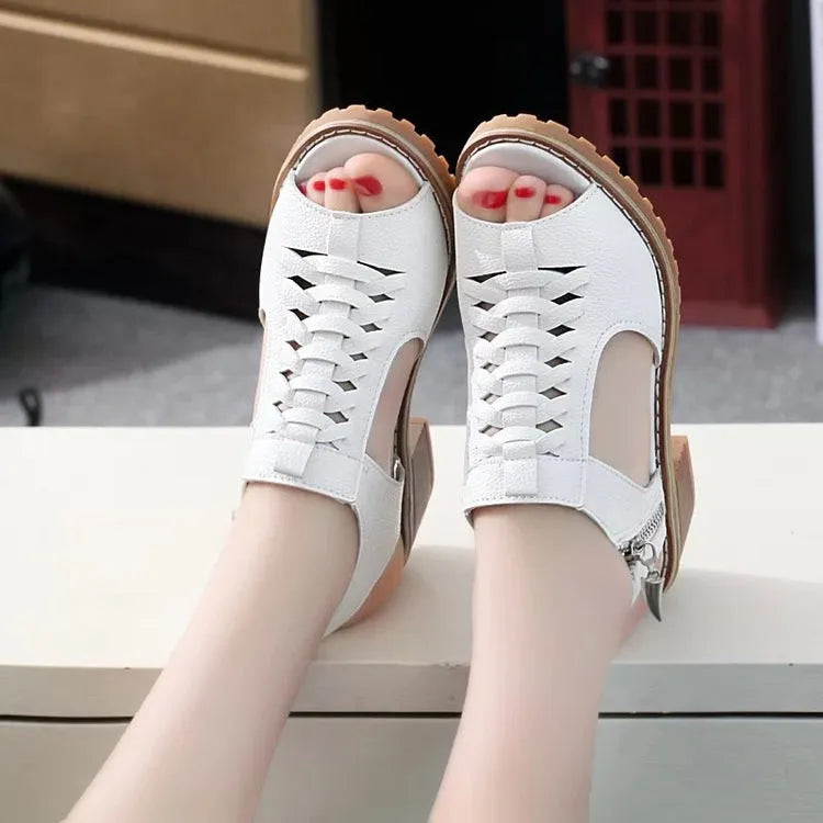 Retro-style women's sandals with a side zipper and a mid-height heel.