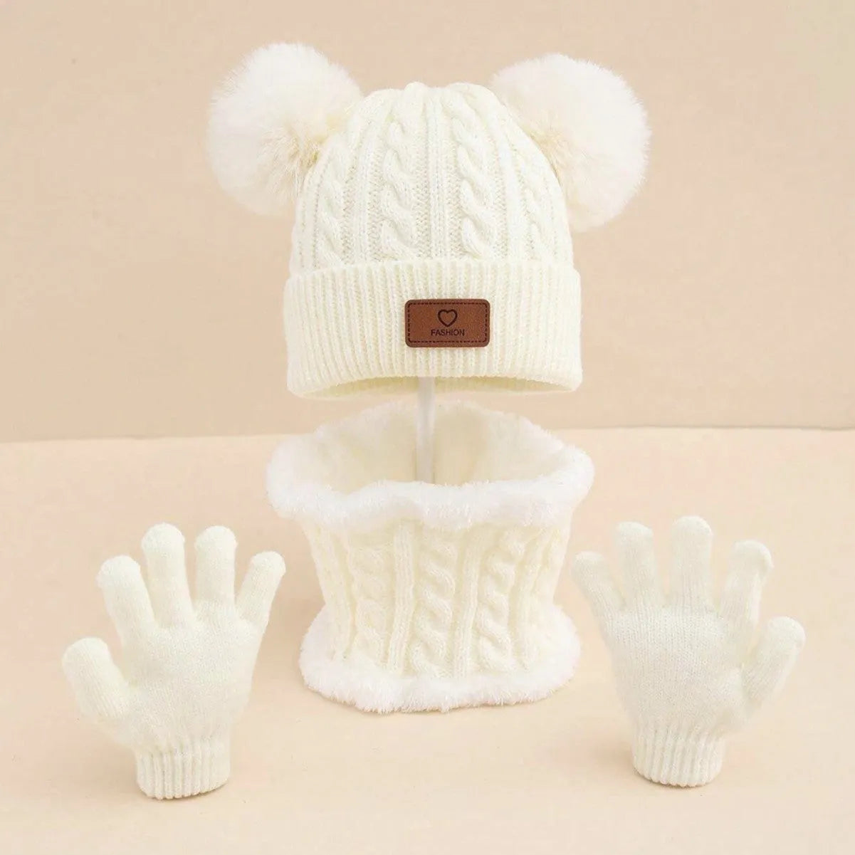 Children's three-piece acrylic knit winter set with dome crown hat and matching scarf and gloves in pink