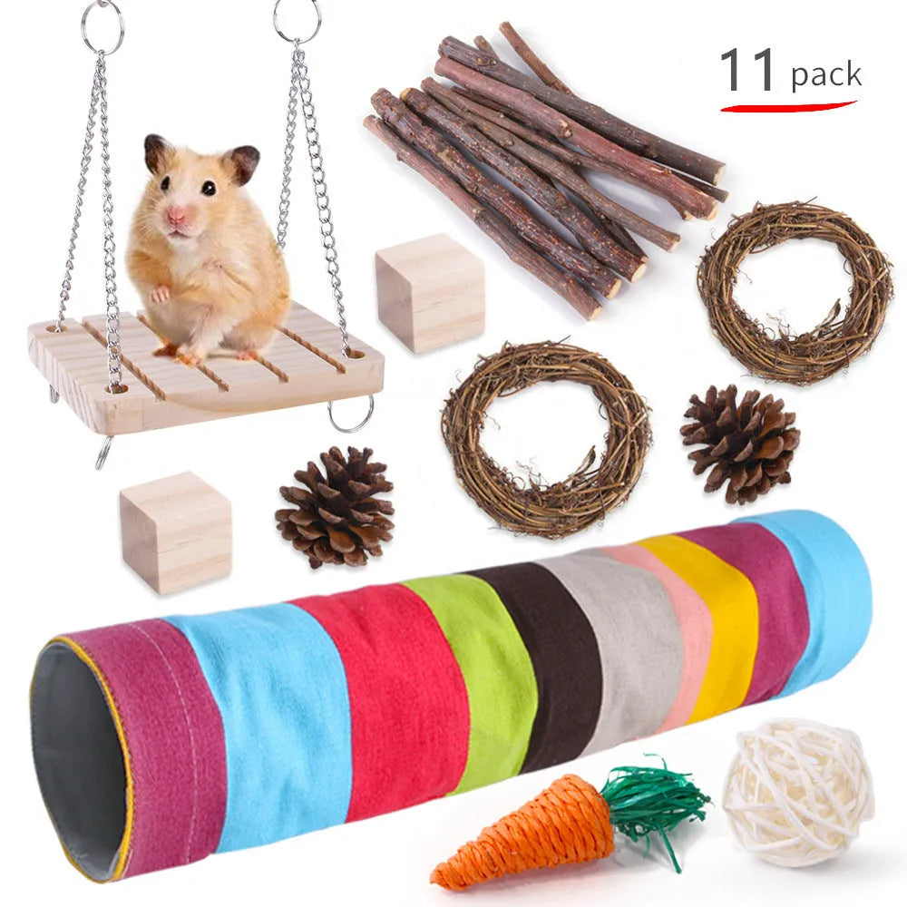 Assortment of natural wooden and woven chew toys for small pets like rabbits and parrots.