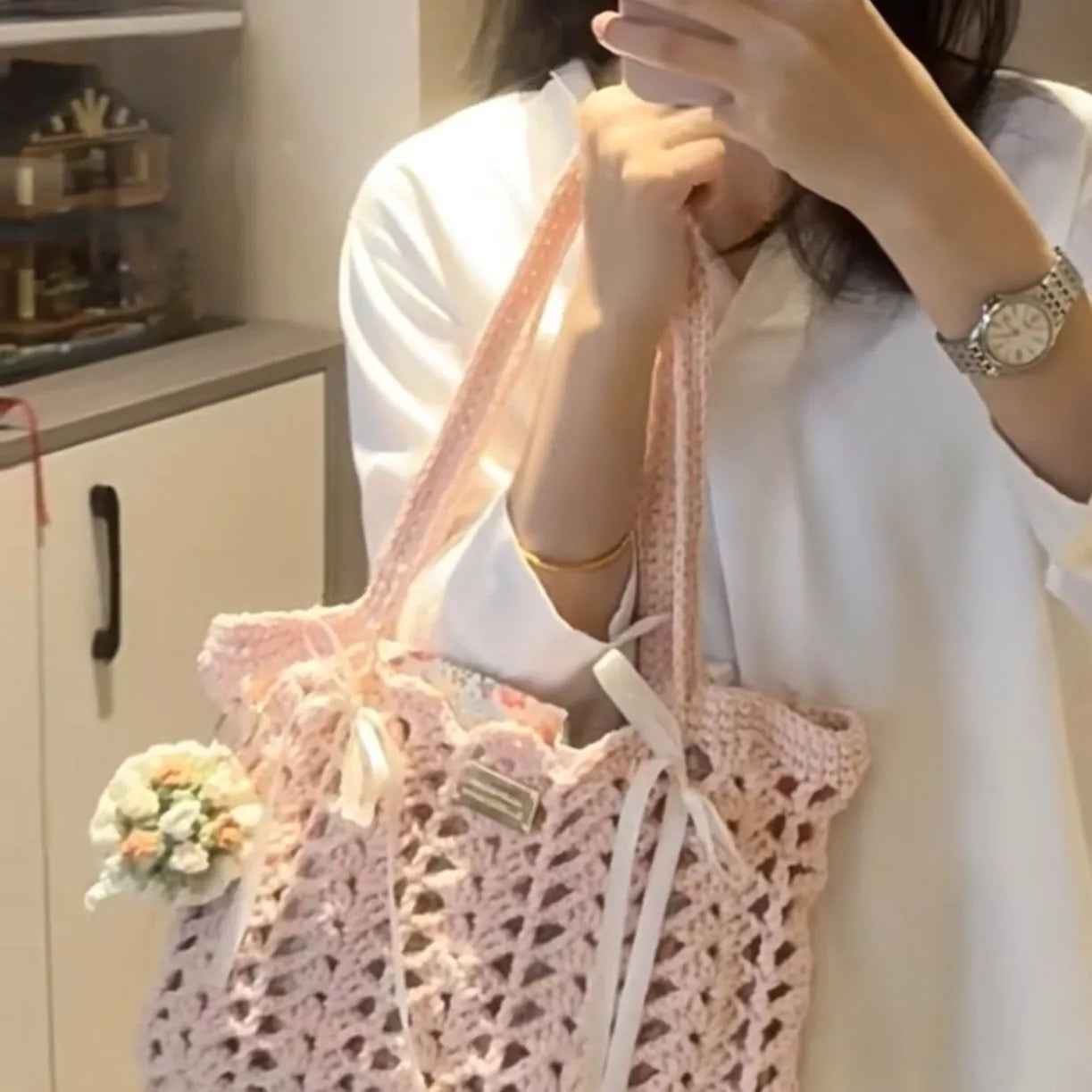 Handwoven wool floral handbag in summer style with natural pattern