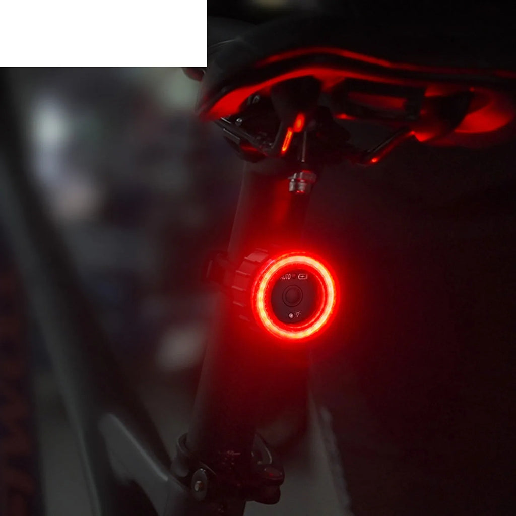 Black intelligent induction bicycle brake light with aluminium alloy construction and seat tube mounting bracket