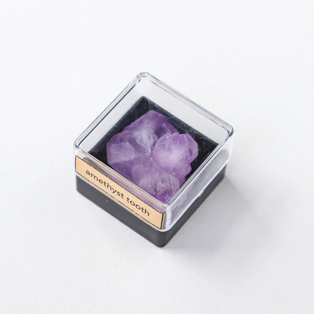 Natural amethyst block crystal mineral specimen geometric decoration on a table
