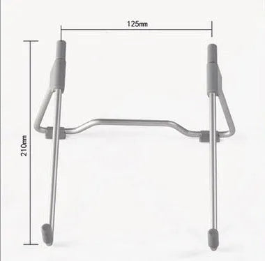 Grey aluminium alloy and plastic mobile phone and laptop stand combo on desk