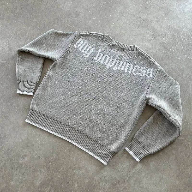 Grey loose-fitting jacquard knitwear coat with long sleeves on hanger