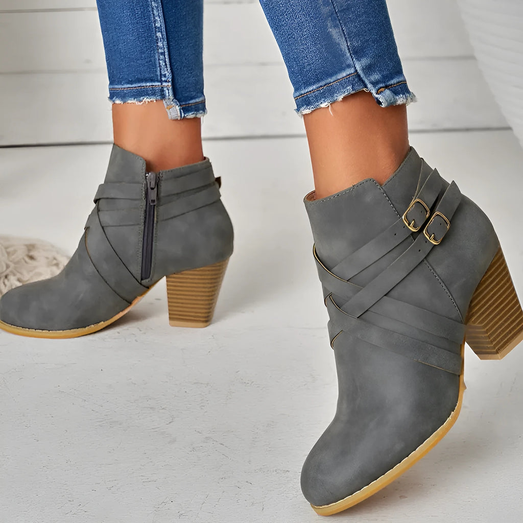 Grey plus size women's ankle boots with 7cm heel, side zip and belt buckle.
