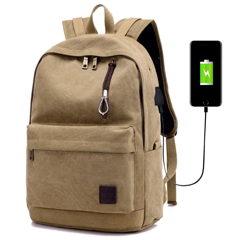 Canvas backpack with USB charging port showing laptop compartment and multiple pockets