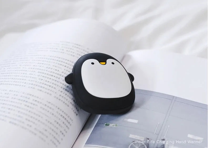 Cute cartoon penguin and polar bear design USB rechargeable electric hand warmer.