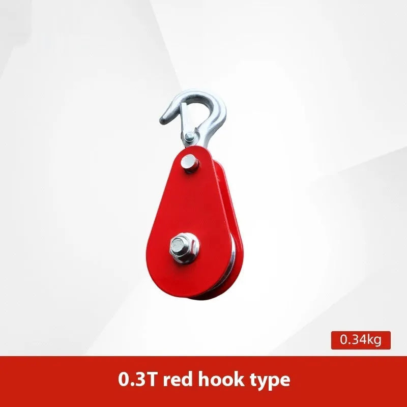 Red industrial lifting pulley with a forged steel safety hook and single wire rope wheel.