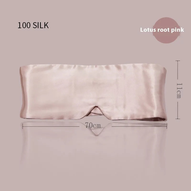 Mulberry silk sleep eye mask shown in champagne gold colour, laid flat on a surface.
