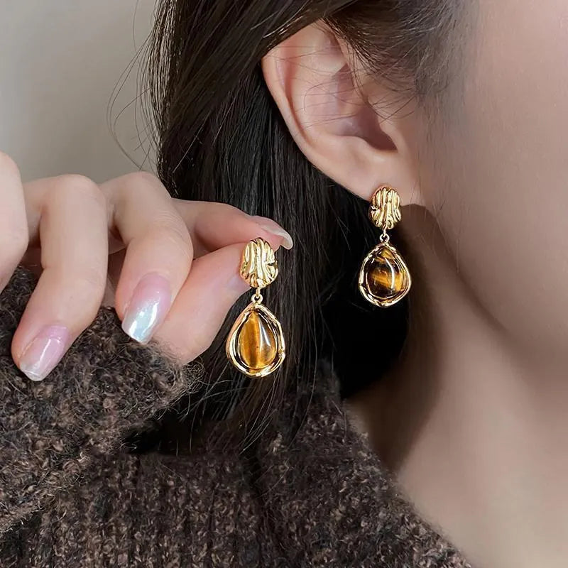 Handmade geometric holiday earrings set with three alloy drop designs featuring tassel elements