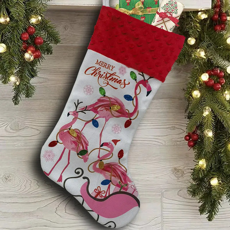 Red cloth flamingo Christmas stocking decoration with white trim, shown hanging.