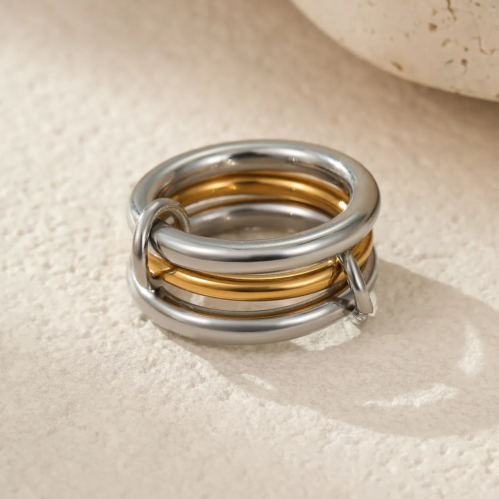 Stacked stainless steel ring with 18K gold plating in three colour variants for women's hand jewellery