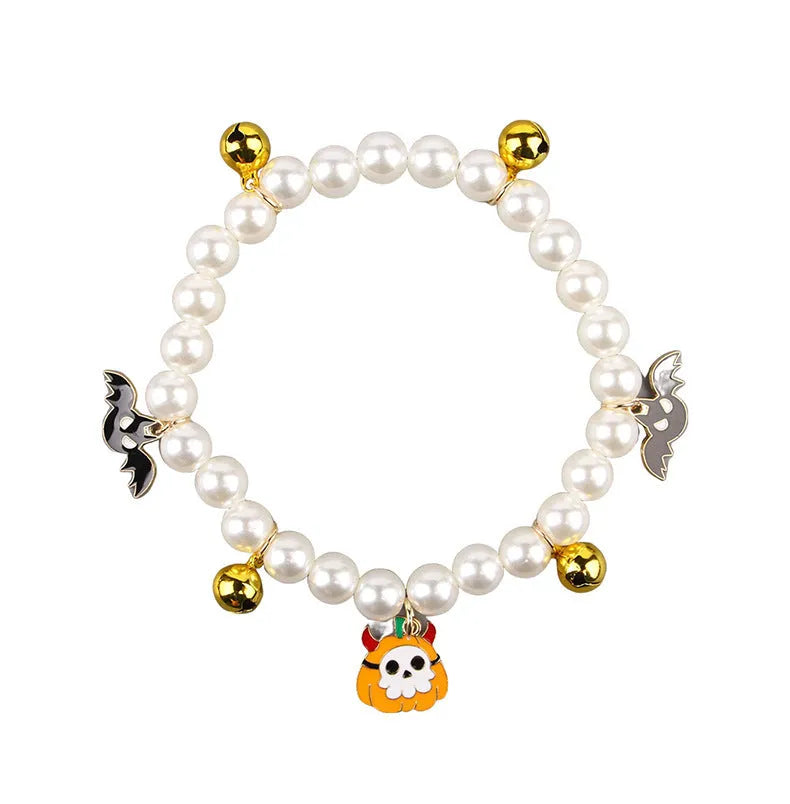 Halloween pearl necklace pet collar with pumpkin designs in purple ghost, skull, and smiling variations