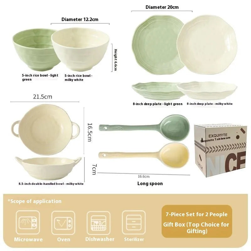 Seven-piece solid colour ceramic tableware set with modern Japanese style design on a table.
