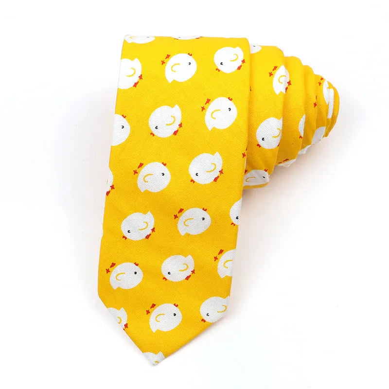 Men's narrow cotton bow tie in a cartoon print with an adjustable knot, shown in a selection of colours.