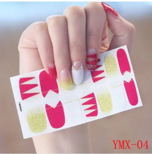 Full nail stickers set of 14 sheets showing 16 colour options in a flat lay arrangement