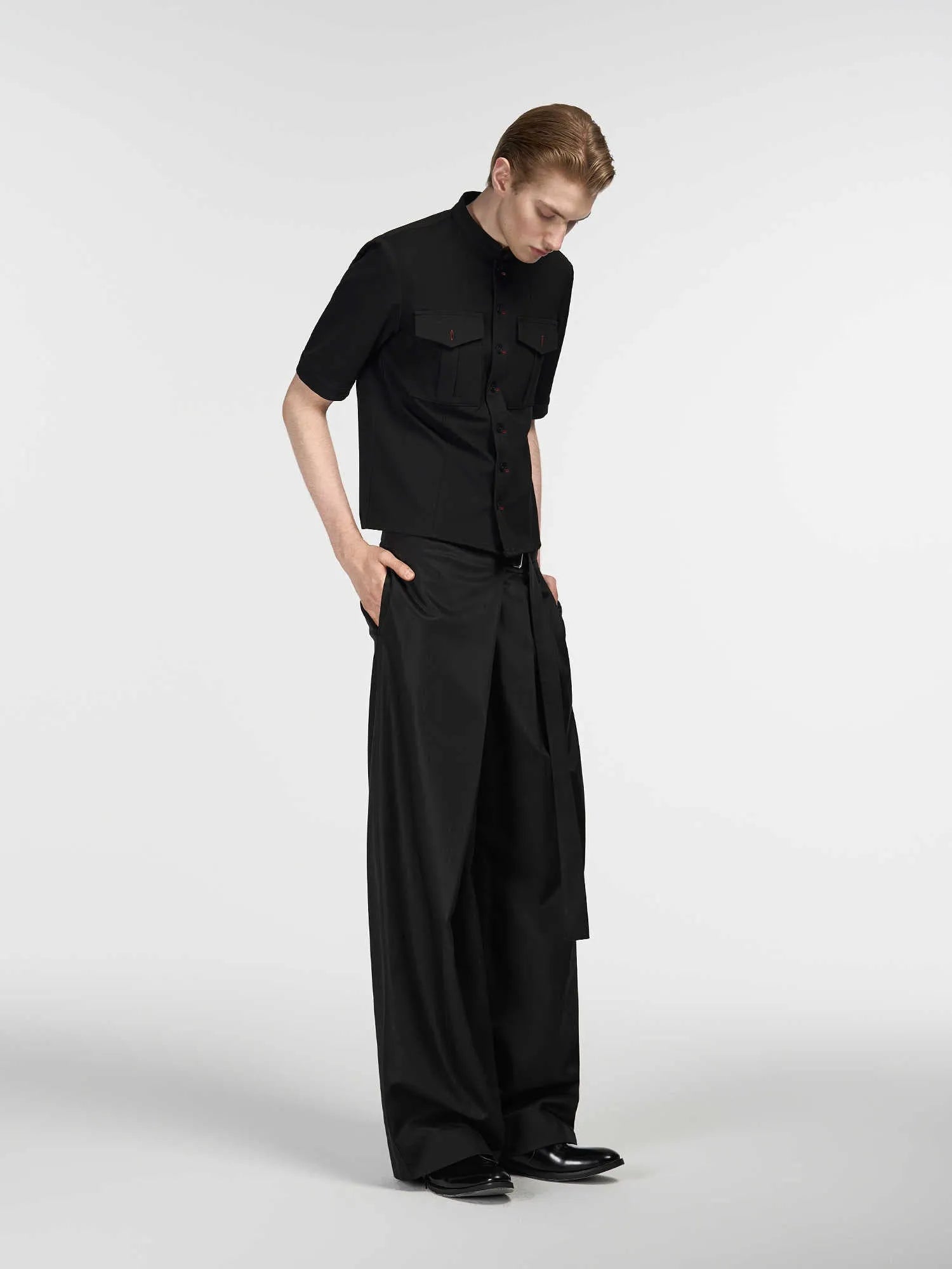 Black straight-leg trousers with single pleated cut and adjustable waist