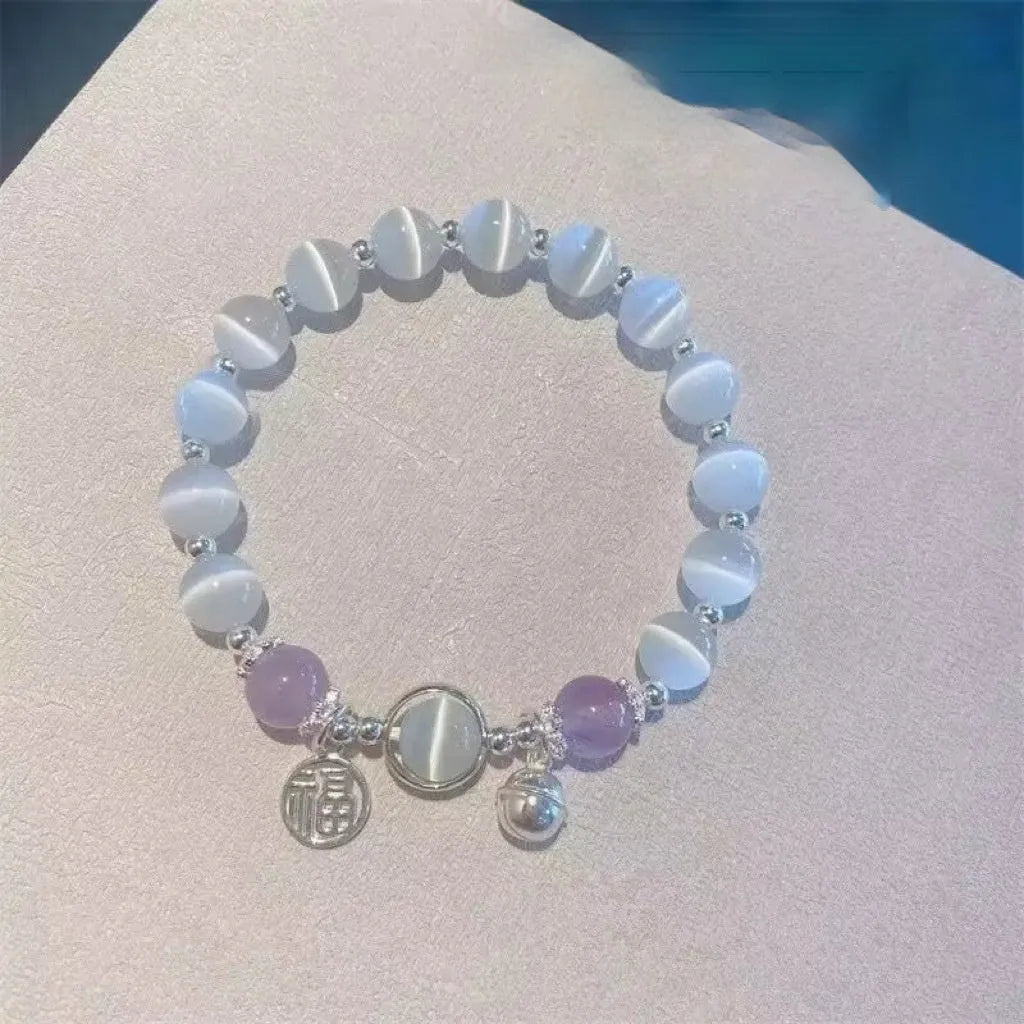 Glass butterfly bracelet for women with colour-coordinated beads in drop-shaped design