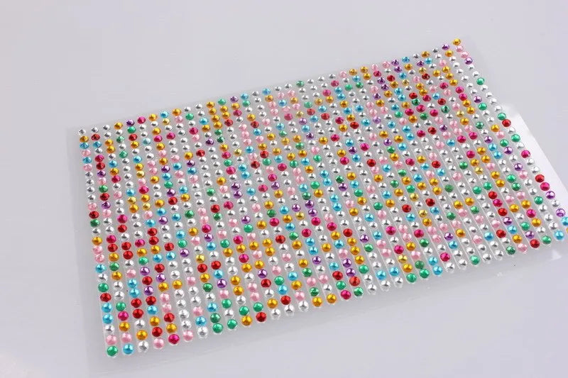 Acrylic rhinestone car drill sticker 22.5x10cm in silver on a car body panel with sparkling finish
